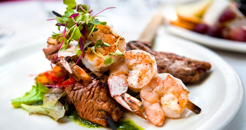 Steak and Shrimp beautifully presented on a plate