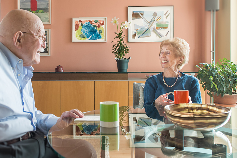 Residents enjoying coffee in an apartment at Kendal on Hudson