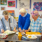 Three women in the art studio