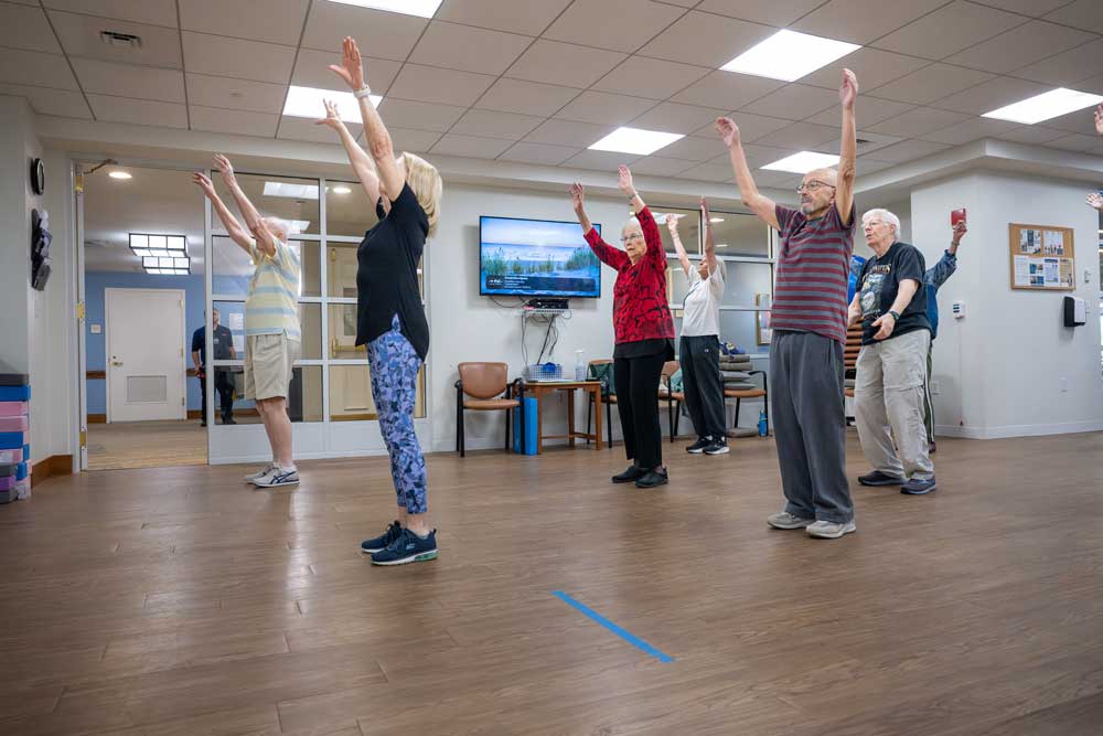 a group of Kendal on Hudson residents participating in a zumba class
